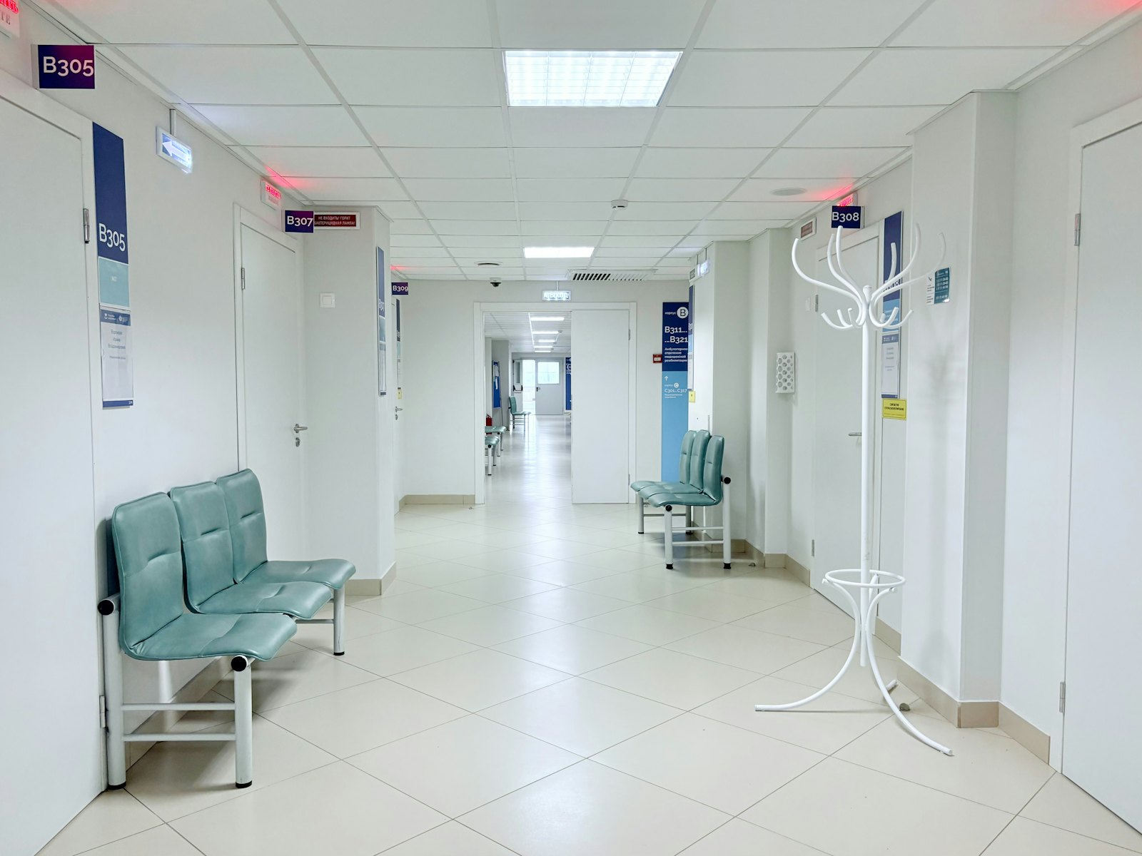Completed NHS Trust corridor after the electrical installation