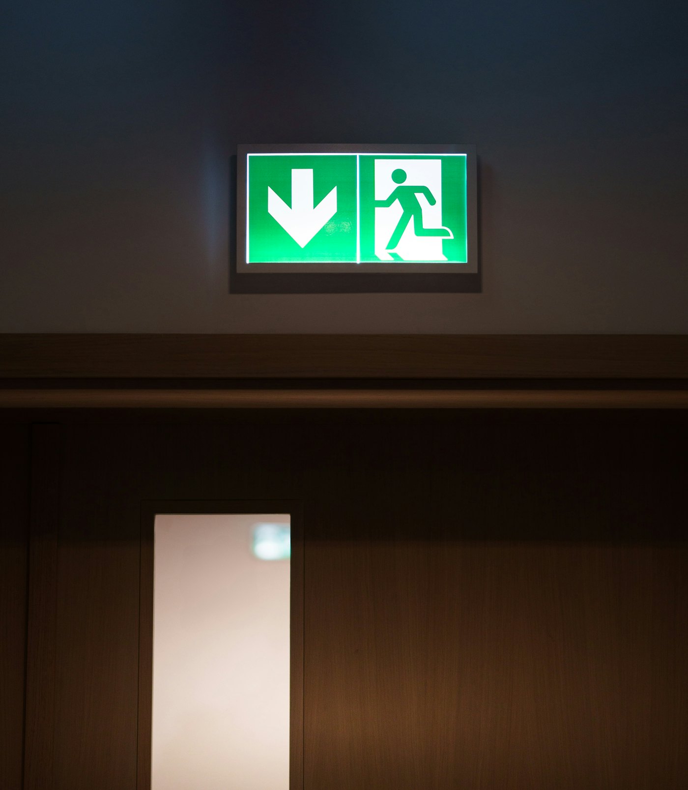 Emergency lighting exit sign installation